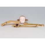 A yellow gold Kukri brooch, a tie pin, bar brooch and cameo ring 10 grams gross