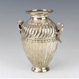 A Continental silver repousse 2 handled urn shaped vase, 232 grams, 16cm