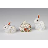 A Royal Crown Derby Imari pattern paperweight of a snowy rabbit with gold stopper 10cm, ditto meadow