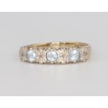 A 9ct yellow gold diamond and gem set ring 2.3 grams, size P
