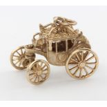 A 9ct yellow gold carriage charm 5.2 grams