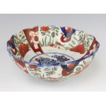 An Imari deep bowl decorated with flowers 21cm