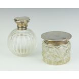 A cylindrical cut glass dressing table jar (f) with silver lid Birmingham 1919 and a cut glass