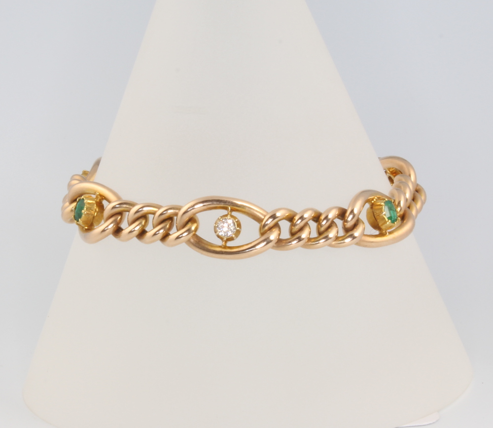 An Edwardian 15ct yellow gold emerald and diamond bracelet, gross 16 grams