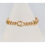 An Edwardian 15ct yellow gold emerald and diamond bracelet, gross 16 grams