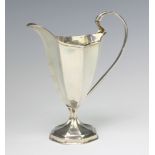 A Victorian octagonal silver helmet shaped cream jug, Chester 1899, 14cm, 94 grams