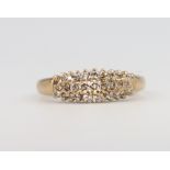 A 9ct yellow gold diamond ring, 2.7 grams, size P