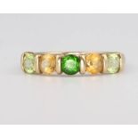 A 9ct yellow gold gem set ring, 1.9 grams, size N