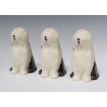 Three Neo Bonassera Rye Pottery seated sheepdogs 15cm