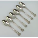 A set of 6 William IV Kings pattern dessert spoons with chased monogram 410 grams