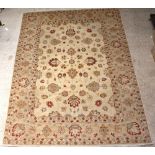 A contemporary yellow and brown ground Caucasian style floral patterned carpet 355cm x 273cm Some