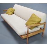 A mid Century teak folding studio couch, the back incorporating storage 75cm h x 184cm w x 80cm d