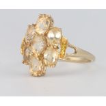 A 9ct yellow gold gem set ring 3.1 grams, size S