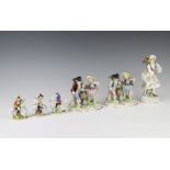 A pair of modern Dresden figure groups of grape gatherers raised on rococo bases 13cm, a German