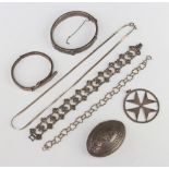 A silver pendant and minor silver jewellery, 124 grams