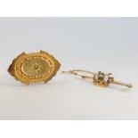 A Victorian gold diamond set etruscan brooch and enamelled bar brooch 12 grams