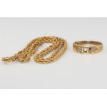 A 15ct yellow gold ring size O, 3 grams and a 9ct yellow gold necklace 3 grams The ring has a