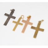 Two yellow gold cross pendants and 2 others, 4 grams