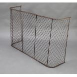 A Victorian brass and mesh nursery spark guard 70cm h x 96cm w 29cm d Slight split to the brass rail