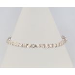 An 18ct white gold diamond tennis bracelet comprising 45 brilliant cut diamonds approx. 2ct, 18.5cm
