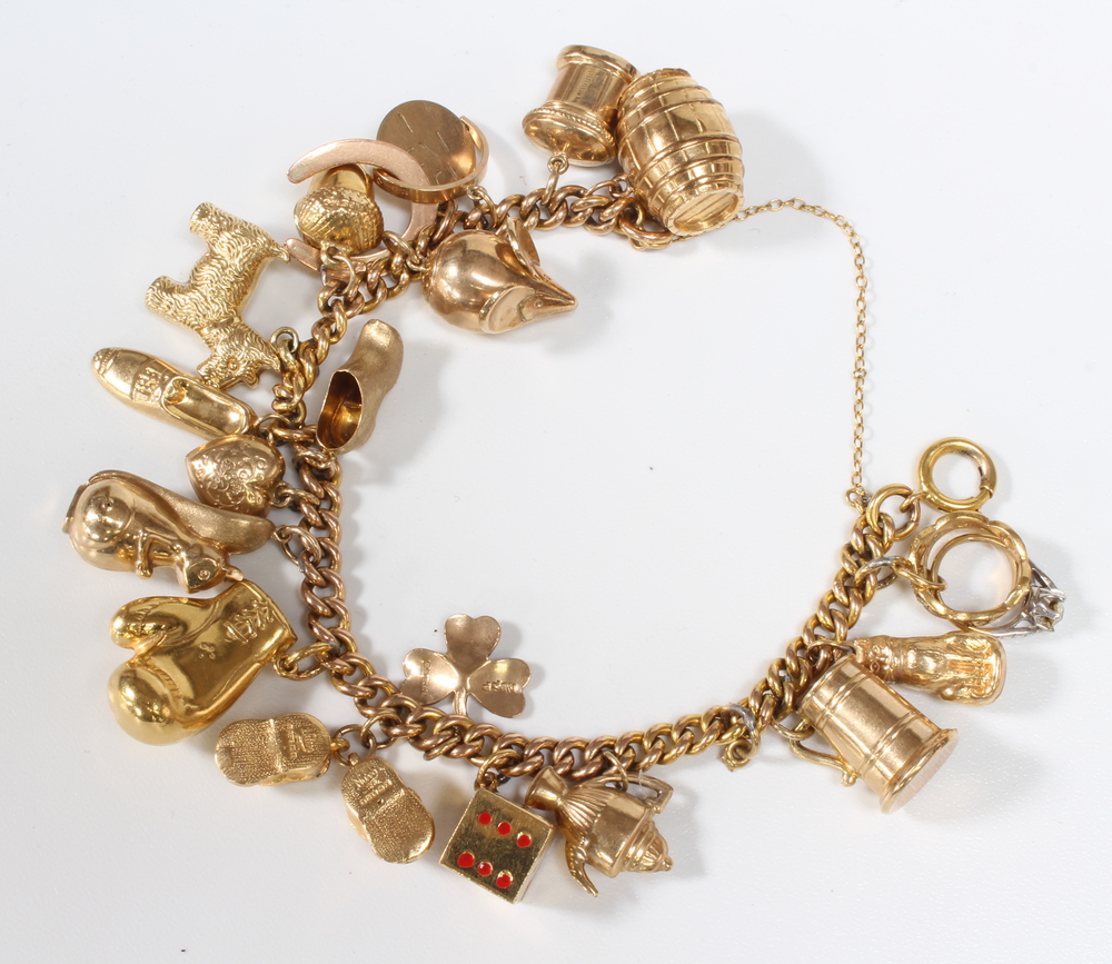 A 9ct yellow gold charm bracelet 36 grams - Image 2 of 2