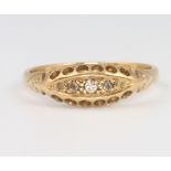 An 18ct yellow gold diamond ring, size O, 2.8 grams