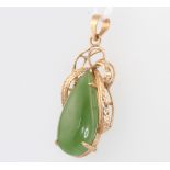 A 14ct yellow gold mounted jade pendant 3.3 grams