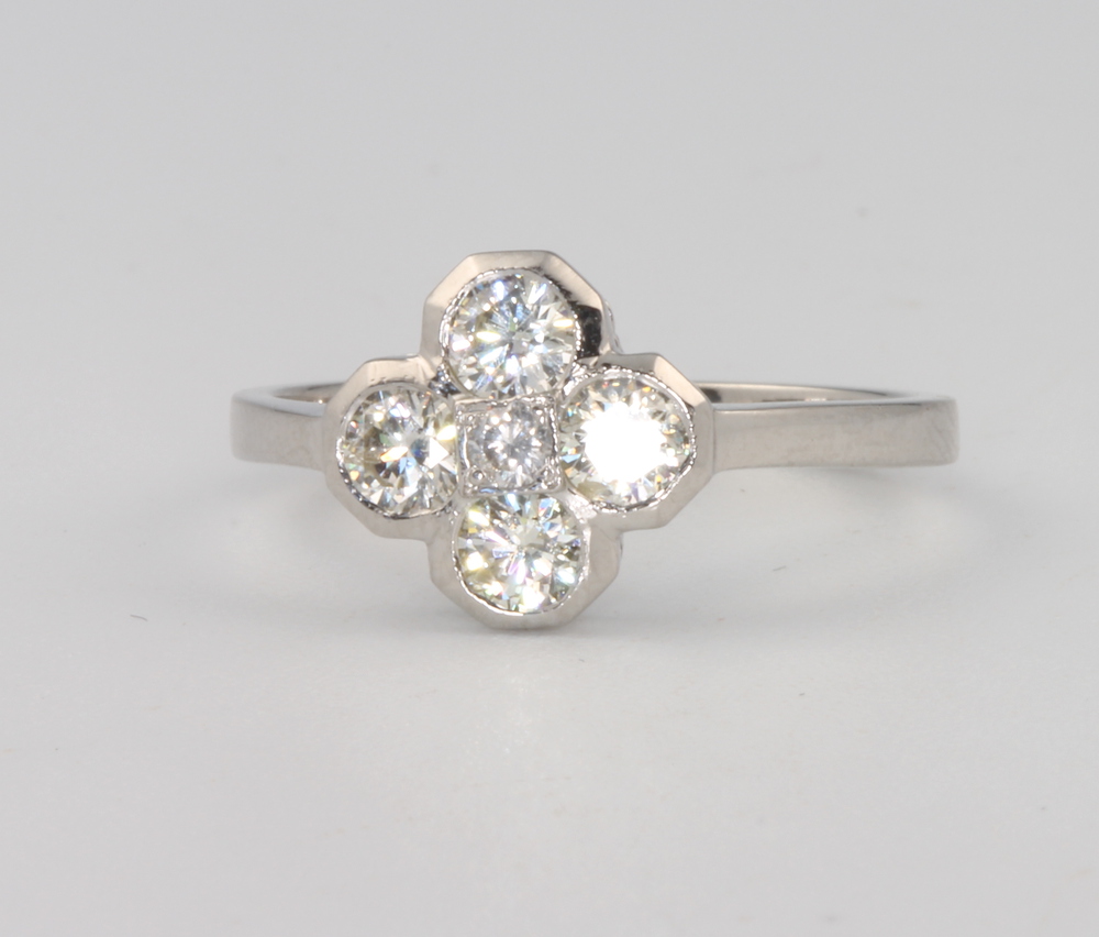 A platinum 5 stone diamond cluster ring, size O, 0.75ct