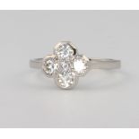 A platinum 5 stone diamond cluster ring, size O, 0.75ct