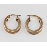 A pair of 9ct yellow gold hoop earrings 1.7 grams