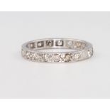 A platinum and diamond eternity ring, 1.7 grams, size K 1/2