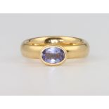 An 18ct yellow gold tanzanite ring 8.7 grams, size L