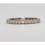 An 18ct white gold diamond half eternity ring 3.3 grams, size Q 1/2