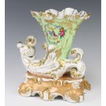 A modern Meissen cornucopia vase decorated with birds amongst flowers raised on a rococo base 27cm