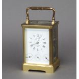 L'Epee Fonde, a 20th Century French 8 day striking on gong carriage clock, the enamelled dial with