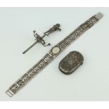 A lady's silver wristwatch and minor jewellery, 60 grams