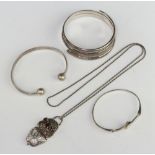 A silver bracelet and minor silver jewellery, 122 grams