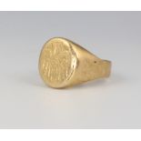 A gentleman's 18ct yellow gold signet ring with engraved monogram, size M 1/2, 5 grams
