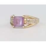 A 9ct yellow gold amethyst and diamond ring, 4 grams, size N