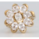 A 9ct yellow gold paste set floral ring, size N, 6.5 grams