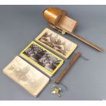 A 19th Century stereoscopic viewer together with a collection of cards comprising 6 by Twiss & Sons,