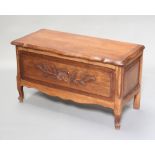 A French carved oak coffer with hinged lid, raised on cabriole supports 49cm h x 88cm w x 40cm d