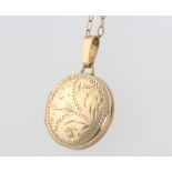A 9ct yellow gold locket and chain 3.2 grams