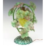 A 1930's Murano green glass table lamp in the form of a bunch of grapes with vinery decoration,