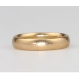 A 9ct yellow gold wedding band 2.9 grams, size L 1/2