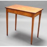 An Edwardian rectangular inlaid and crossbanded occasional table raised on square tapered supports