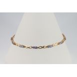 A 9ct yellow gold gem set necklace, 19cm, 5.4 grams