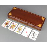 An Edwardian rectangular inlaid mahogany 4 division card box with hinged lid fitted 4 full packs