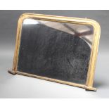 A 19th Century D shaped over mantel mirror contained in a gilt frame 83cm h x 123cm The silvering to