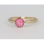 A 9ct yellow gold pink gem set ring 2 grams, size P